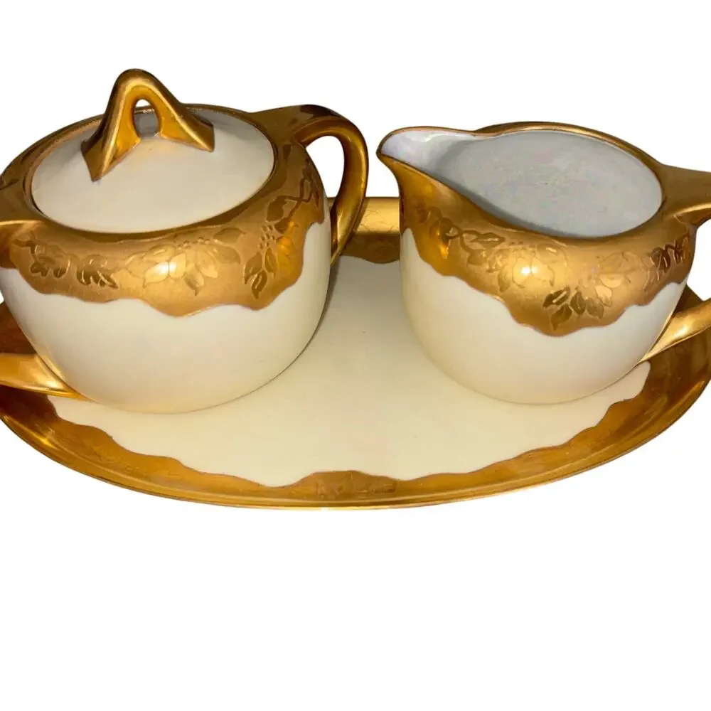 Vintage gold porcelain creamer and sugar by Thomas Bavaria beautiful pieces
